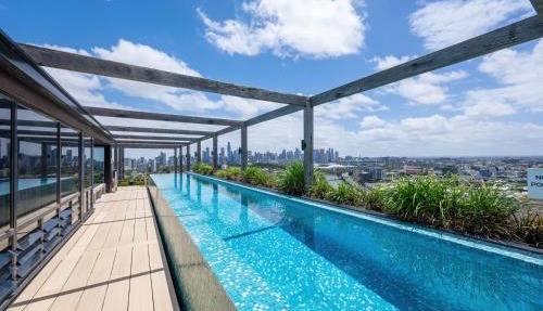 Skyline Serenity with Rooftop Pool