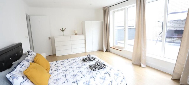 Spacious 3-Story Retreat with Rooftop Terrace and Modern Amenities