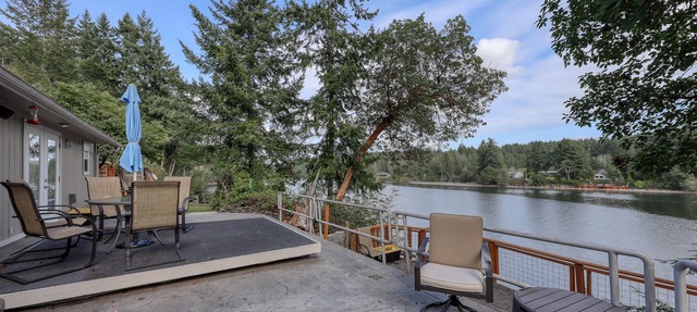 Spacious waterfront home with hot tub, large decks, kayaks, and beach access