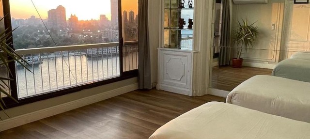 Stylish 3BR Apartment with Stunning Nile View