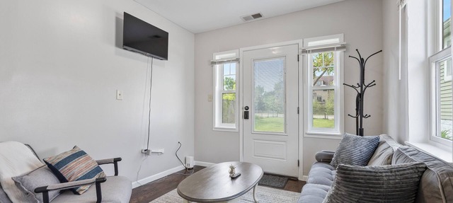 Super Sleek large Tiny house by Westmont Metra large enclosed yard and parking.