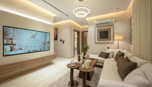 Velora Living Royal 2BR Apartment 70 TV
