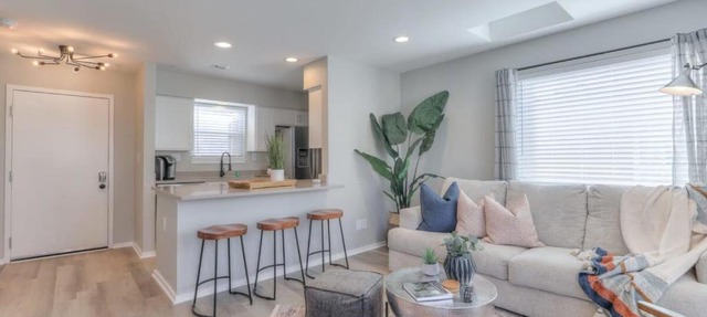 Walk to Broadway Riverfront Condo with Pool