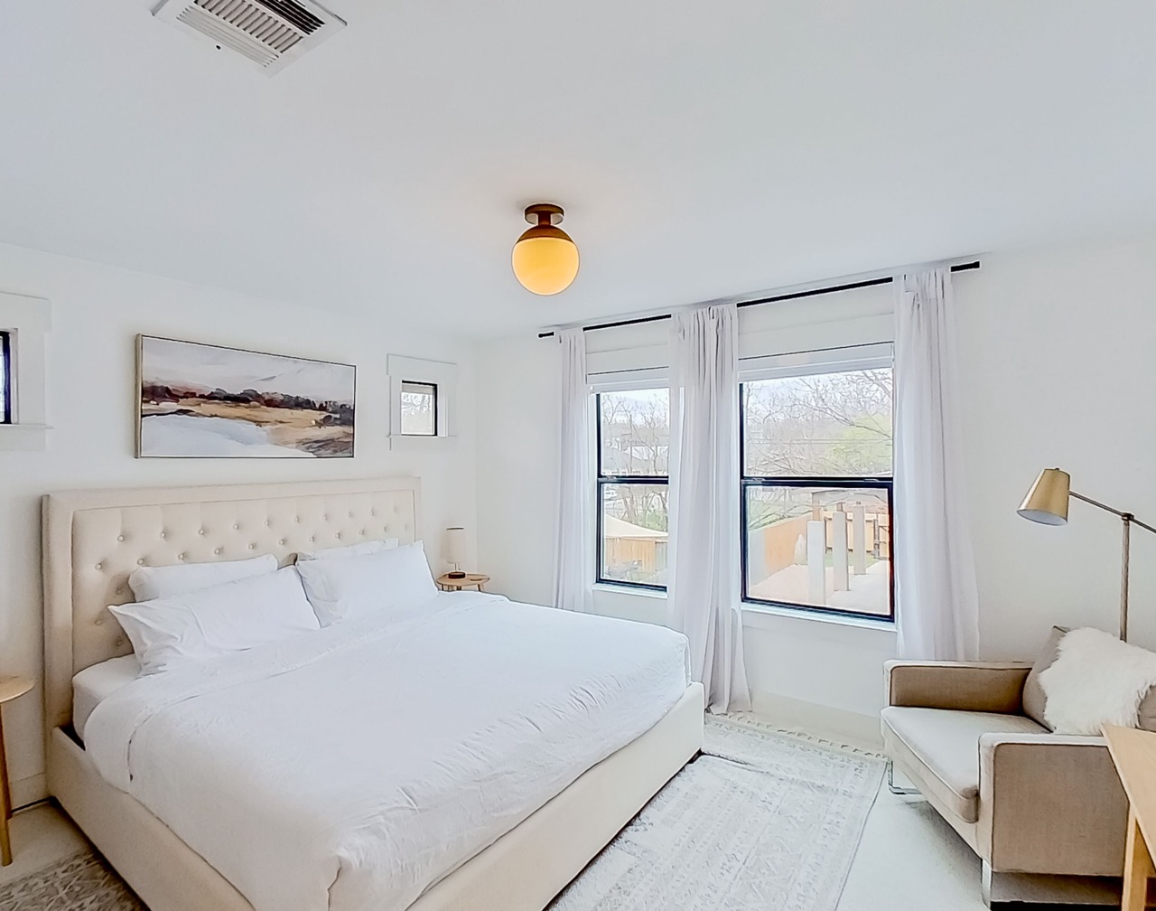 Modern 2-story dog-friendly condo with quaint patio, central AC & washer/dryer 1