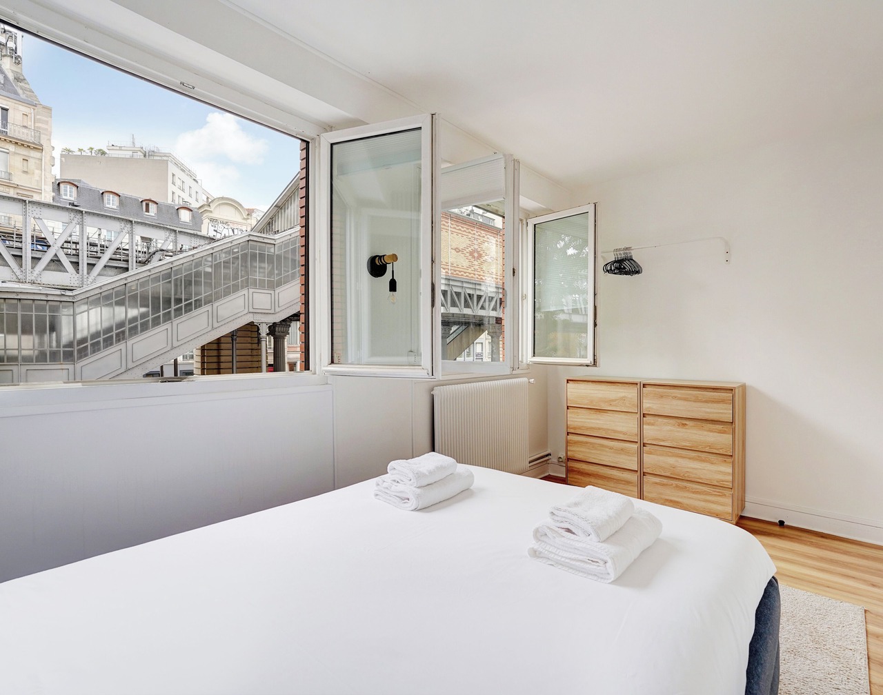 Soothing 2-bedroom apartment with AC in vibrant Paris 1