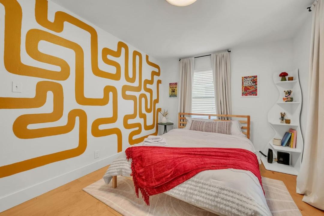 Colorful Home with Private Yard - Walk to East 6th 1