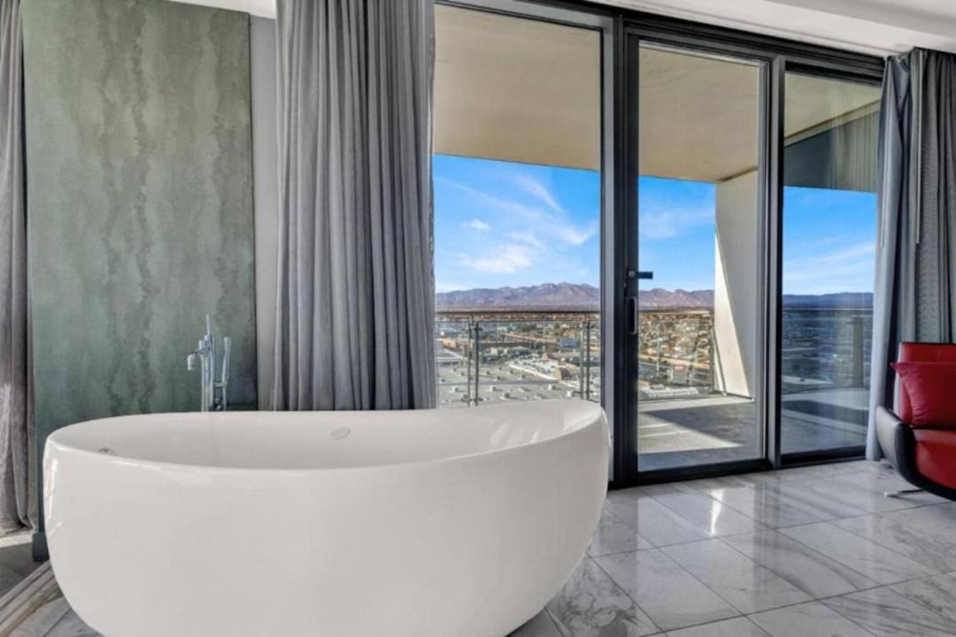 1 Bedroom Balcony Collection Living Room & Jet Tub Bath - StripSuite Palms Place Hotel, Resort & Casino - NO RESORT FEE 1