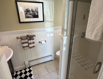Dive into downtown Newport RI in this private, large, unique townhouse-style 2BR apartment at 205 Spring St! King and Full beds + pull-out sofa full kitchen, 2 baths, outdoor patio, AC, TVs, Wifi. Just steps to Thames Street, shops and wharfs 2