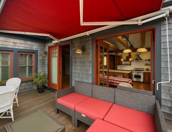 Step into historic magic at this renovated post-and-beam loft in downtown Newport RI! Open floor plan, cozy beds, full kitchen, two decks for outdoor dining, mini-split AC, TVs. Steps to Thames Street, shops, wharfs—Superhost 2