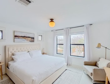 Modern 2-story dog-friendly condo with quaint patio, central AC & washer/dryer 3