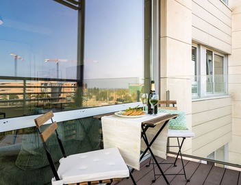 Modern 2-Bedroom Apartment with Balcony & Pool Access Near Forum Beach 4