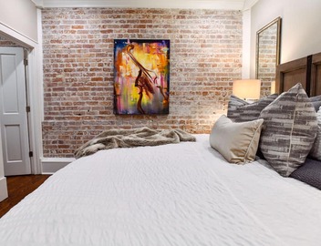 Historic Charm Meets Modern Comfort: Condo in Historical Picayune Building 2