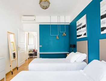 This recently renovated, beautiful, bright apartment has been completely redesigned. It is located on the 4th floor with elevator. There are three bedrooms: the first with a large double bed (180cmx200cm), the second bedroom has two single beds and the th 2