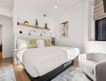 Luxury 1BR: Sleek Kitchen + City Charm | Suite 2 4