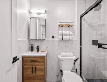 Luxury 1BR: Sleek Kitchen + City Charm | Suite 2 3