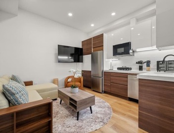 Luxury 1BR: Sleek Kitchen + City Charm | Suite 2 5