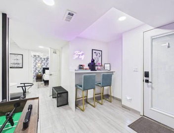 Expertly designed 5BR Art Deco duplex with garage. 3