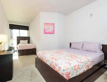 Modern 3BR City Escape | Balcony & Rooftop Pool 5