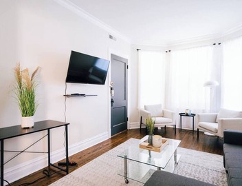 Spacious 3-bedroom retreat in West Logan with modern amenities, perfect for families looking to relax and explore vibrant Logan Square. 3