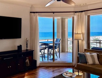 Exclusive Sandpearl Residences condo with Gulf views heated pool spa grills 5