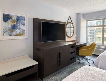Stylish Retreat: Minutes from National Mall! On-site Bar, Pets Allowed | 2 Units 2