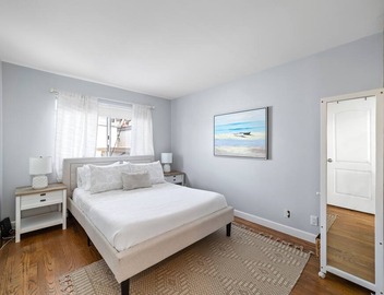 Top Floor Unit with Panoramic Views Steps to the beach with 3 Parking Spots! 3