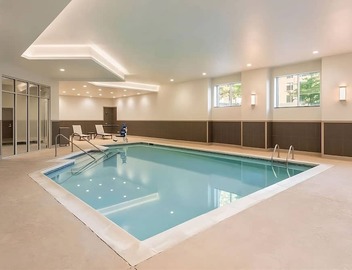 Relaxing 2 Queen Bed Stay Near Peace Center! Onsite Gym and Pool Access! 4