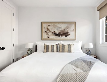 2 Bedroom Suite with Private Yard & Off-Street Parking. Full kitchen & living. 2