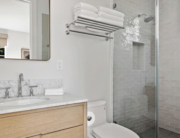 2 Bedroom Suite with Private Yard & Off-Street Parking. Full kitchen & living. 3