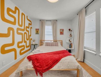 Colorful Home with Private Yard - Walk to East 6th 2