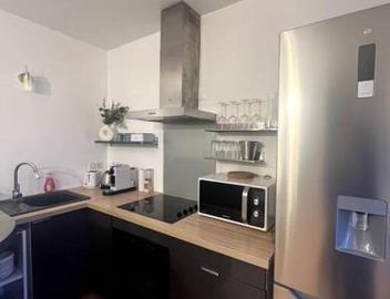 WonderSuite appartement - centre ville avec parking couvert -15mn de Paris et 10 mn de Stade de France, wifi, Netflix 4