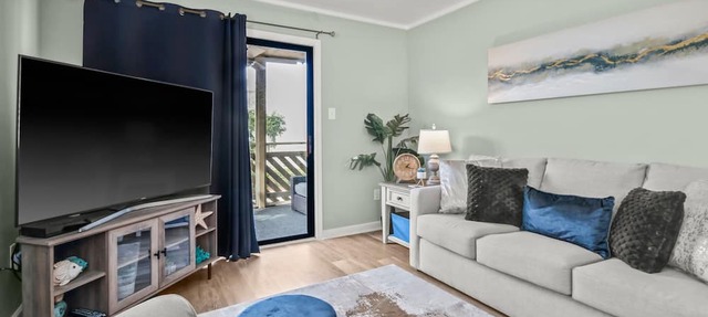 Condo across the street from the beach with pool, spa, & private balcony