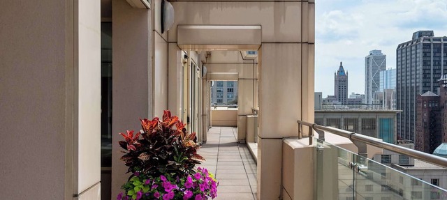 Elegant 2BR with Resort Amenities & City Views