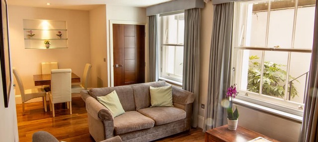 Modern apartment with sofa bed, patio and private entrance