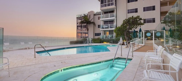 Oceanfront Gem w/Balcony, Pool, Hot Tub & Carbon Beach Access | Bluewater Haven