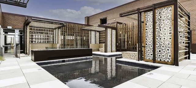 Modern 2BR Oasis with Scenic Rooftop & Gym