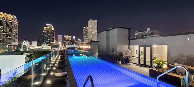 Rooftop Pool | Full Kitchen | Game Room | Hotel