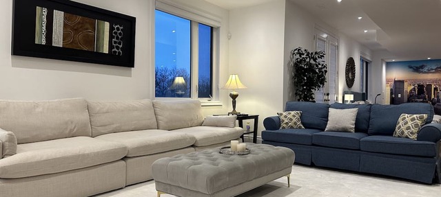 Luxurious open concept 2 bedroom apt on ravine, pond, central, airport, shopping