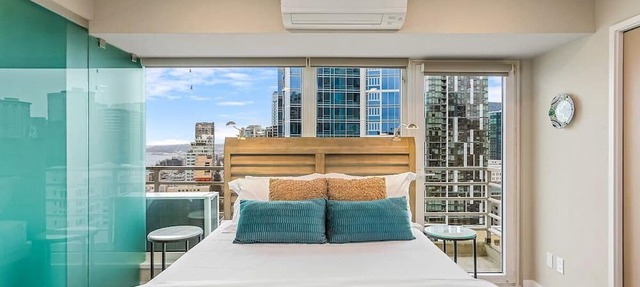 NewMark Tower’s Water Wheel Condo with Sea Views