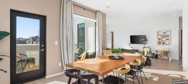 Penthouse on River with Garage and Patio, Walk to Downtown