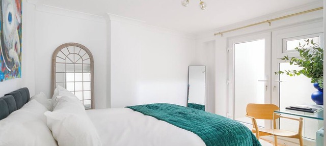Stylish newly renovated 2BR garden apartment in the heart of Maida Vale, featuring a bright open-plan living space, private courtyard terrace, fast WiFi, and excellent transport links. Just a short walk to multiple tube stations.