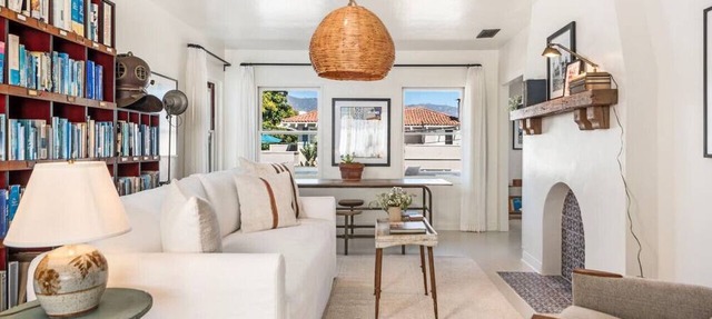 Library Suite – The Marlowe Seaside Inn: Spacious one-bedroom suite in Santa Barbara featuring a sunny writing sunroom, private balcony, and vintage decor.