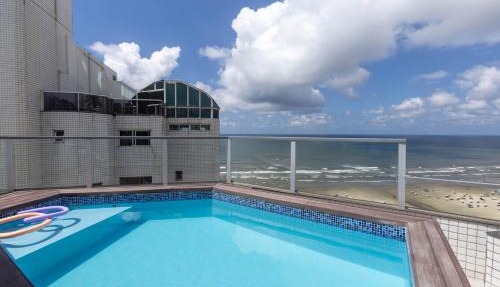 Cobertura a beira mar com piscina e churrasqueira