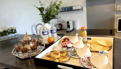 WonderSuite appartement - centre ville avec parking couvert -15mn de Paris et 10 mn de Stade de France, wifi, Netflix