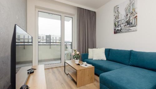 Łopuszańska Apartment with Balcony in Warsaw by Noclegi Renters