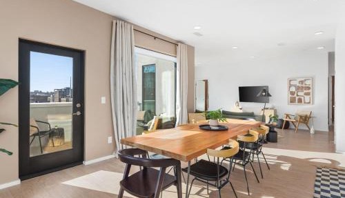 Penthouse Condo on River with Garage and Patio, Walk Downtown