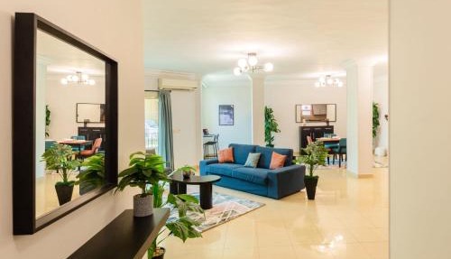 Distinct & Decent 2 BDR Apt Steps From Nightlife and Airport