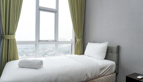 Fabulous 2BR Apartment Lucky Tower Residence By Travelio
